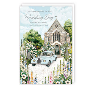 Send your best wishes with this charming wedding card featuring a vintage car parked outside a quaint church. The scene is beautifully adorned with floral arrangements, and the elegant foiling adds a touch of refinement. This card is perfect for expressing your heartfelt congratulations to the happy couple on their special day.